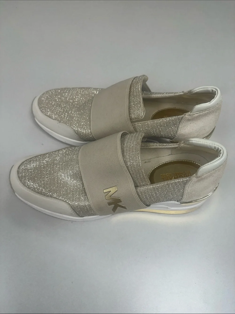 MICHAEL KORS Women’s Size 10 Felix wedge champagne gold slip on fashion sneakers
